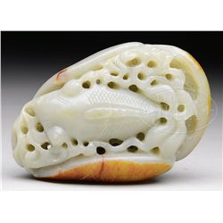 CARVED JADE PEBBLE.
