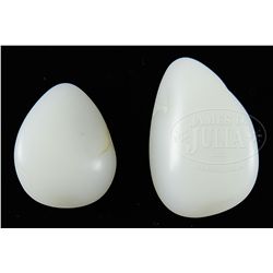TWO WHITE JADE PEBBLES.
