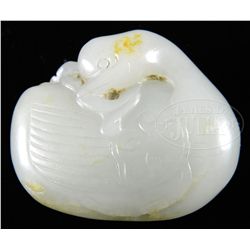 CARVED JADE PEBBLE.