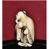 Image 1 : Ivory netsuke of a bearded man singed.