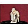 Image 5 : Ivory netsuke of a bearded man singed.