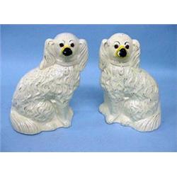 PAIR OF SEATED STAFFORDSHIRE SPANIELS
