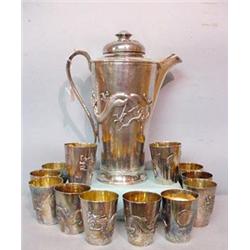 THIRTEEN PIECE ORIENTAL SILVER WATER SET