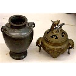 TWO ORIENTAL PIECES: Bronze urn with two stylized elephant head handles