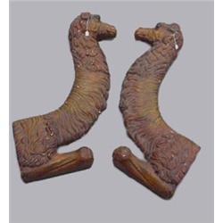 PAIR OF CARVED CAMEL HEADS FROM A CIRCUS WAGON