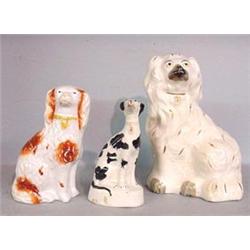 THREE STAFFORDSHIRE DOGS