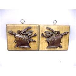 PAIR OF CARVED WOODEN PLAQUES