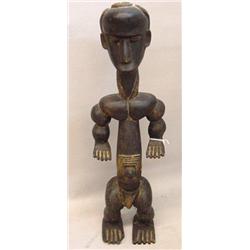 CARVED WOODEN GUARDIAN FIGURE