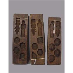 THREE WOODEN RICE MOLDS