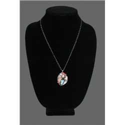 Silver and Turquoise Pendant with Bear Claw.  Signed