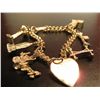 Image 2 : COSTUME JEWELRY GOLD TONE BRACELET WITH CHARMS