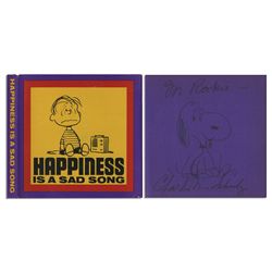 Charles Schulz Hand-Drawn Sketch of Snoopy, Within His Signed ''Peanuts'' Book, ''Happiness is a Sad