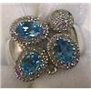 Image 1 : 18 KT. WHITE GOLD, DIAMOND AND BLUE TOPAZ RING, the diamonds  totaling approximately .40 cts., th…