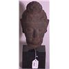 Image 1 : INDIAN CARVED STONE HEAD OF A DEITY, 18th/19th century, modeled  with wavy hair, set on a modern …
