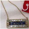Image 1 : 14 KT. YELLOW GOLD, DIAMOND AND SAPPHIRE PENDANT, the sapphires  spell "KISS", the diamonds total…