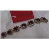 Image 1 : 14 KT. YELLOW GOLD, DIAMOND AND RUBY BRACELET, the diamonds  totaling approximately 2.75 cts., th…