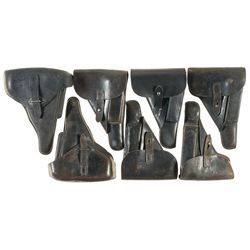 Seven German P38 Style Holsters and Magazines
