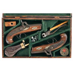 Cased Pair of Unmarked Matching Percussion Derringers with Accessories -A) Percussion Derringer