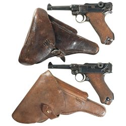 Two DWM Luger Semi-Automatic Pistols with Holsters and Extra Magazines -A) 1918 Dated Luger Pistol