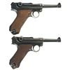 Image 2 : Two DWM Luger Semi-Automatic Pistols with Holsters and Extra Magazines -A) 1918 Dated Luger Pistol