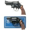 Image 1 : Two Smith & Wesson Double Action Revolvers -A) Smith & Wesson .357 Magnum Pre-Model 27 Revolver with