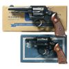 Image 1 : Two Boxed Smith & Wesson Double Action Revolvers -A) Smith & Wesson 38 Military and Police Pre-Model