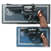 Image 1 : Two Boxed Smith & Wesson Double Action Revolvers -A) Smith & Wesson Model K-22 Combat Masterpiece Re
