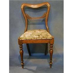 A set of 6 Victorian rosewood spoon back chairs with shaped mid-rails and upholstered drop in sea...