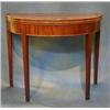 Image 1 : A Georgian mahogany demi-lune shaped tea table inlaid satinwood stringing and raised on square re...