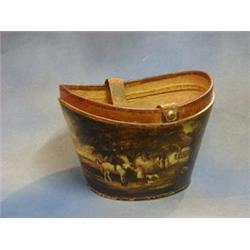 A 19th Century leather hat box painted landscape scenes 13"  £200-250...