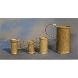 3, 17th/18th Century graduated pewter measures, the rims with numerous marks, together with a 17t...