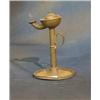 Image 1 : A pewter oil lamp raised on a circular base 7" £40-60...