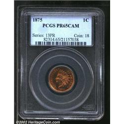 1875 1C PR65 Cameo PCGS. A well struck Gem that has fiery orange-gold color. A tiny planchet flaw (a