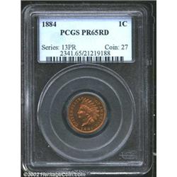 1884 1C PR65 Red PCGS. Lovely intermingled gold and yellow-green colors. A well struck Gem with radi