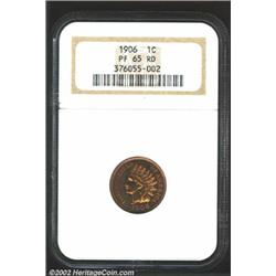 1906 1C PR65 Red NGC. The otherwise rich, cherry-red luster brightens to orange-red shades in the ce