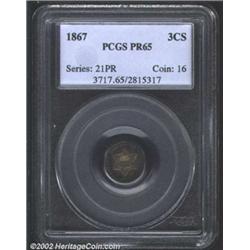 1867 3CS PR65 PCGS. Gorgeously toned in bands of golden-brown, rose, and electric-blue patina. A raz