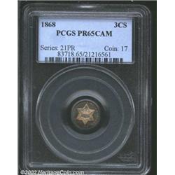 1868 3CS PR65 Cameo PCGS. Gorgeous golden-brown, electric-blue, and rose-violet patina. Well struck.