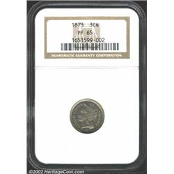 1873 3CN Closed 3 PR65 NGC. The margins have lemon-gold patina, while the centers are lavender in co