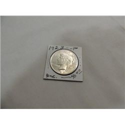 1923 UNCIRCULATED PEACE SILVER DOLLAR.