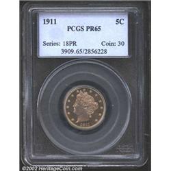 1911 5C PR65 PCGS. Light crimson blue patina sits over this coins nicely preserved surfaces with onl