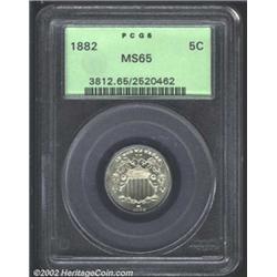 1882 5C MS65 PCGS. Attractive lustrous coin. There are no singularly distracting blemishes.From the.
