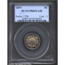 1875 5C PR65 Cameo PCGS. Darkly mirrored surfaces with a few streaks of blood red coloration. Only a