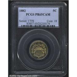 1882 5C PR65 Cameo PCGS. Sharply struck with nice golden patina and noticeable cameo contrast. The f