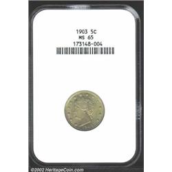 1903 5C MS65 NGC. Intermixed green and crimson patina. Well struck with only a few very minor imperf