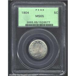 1904 5C MS65 PCGS. Pleasing blue and gold luster. Somewhat weakly struck along the stars. A small pl