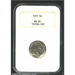 1917 5C MS65 NGC. Golden patina with a few spots of crimson. Well struck legends and good detail in.