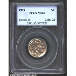 1919 5C MS65 PCGS. This is a bright, lustrous Gem with shimmering surfaces and delicate golden patin