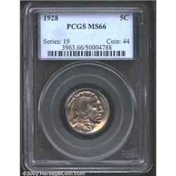 1928 5C MS66 PCGS. Lustrous with yellow and faint blue shimmering across its otherwise steely surfac