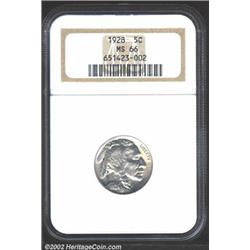 1928 5C MS66 NGC. Golden hued with some slight ice-blue flashes. This Gem has sharp legends and good