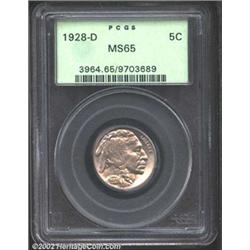 1928-D 5C MS65 PCGS. Pearly white luster with a few underlying hints of yellow. A very light planche